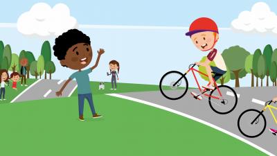 Cycliste FAMIWAL encouragé par un spectateur